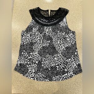 White House Black Market Black and White Patterned Blouse with intricate lace